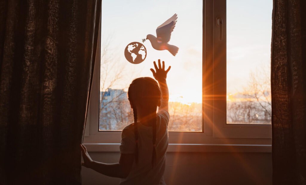 Child reaches for peace